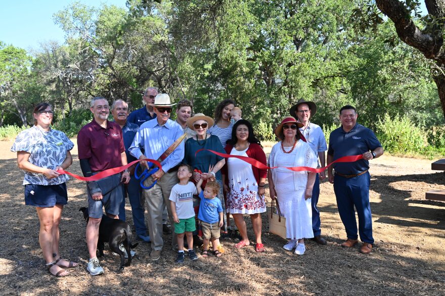 New Braunfels leaders and volunteers cut the opening ribbon