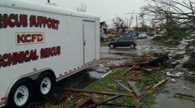 One of many fire departments on the search for the living and the dead.