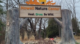 Sign for Howell Nature Center with logo and the words "Heal. Grow. Be Wild."