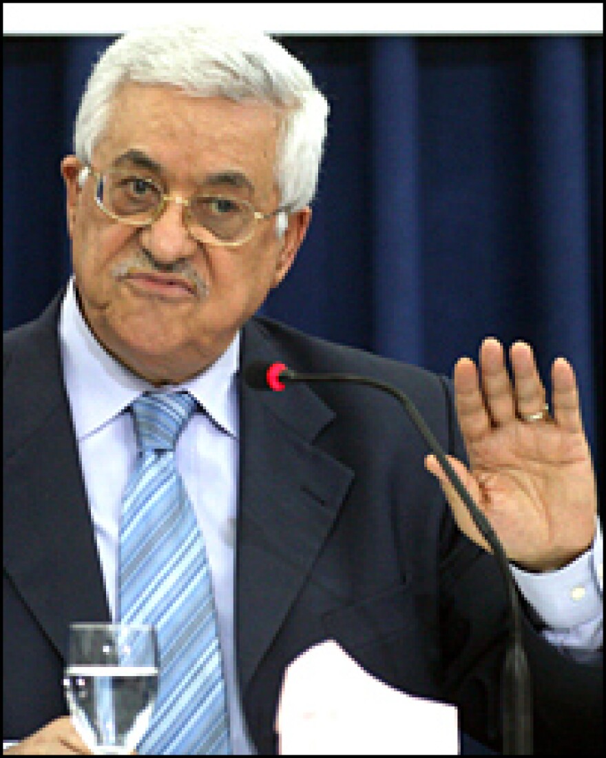 Palestinian President Mahmud Abbas gestures as he delivers a keynote speech to the central council of the Palestine Liberation Organization in his West Bank base in Ramallah. Abbas said there would be no dialogue with "terrorists, murderers and putschists," following the Hamas takeover of the Gaza Strip.