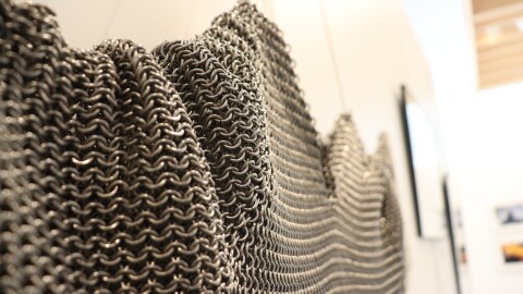 Ben Strohm, program services director at the Williamsburg Regional Library, enjoys making chainmail. His 28-pound shirt is part of the "Shelf Life" exhibition at the Stryker Center. The exhibition includes works by library employees and volunteers.