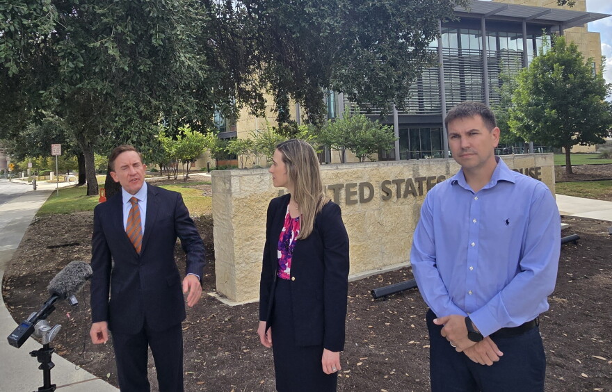 Alek Schott, far right, joins his attorneys Jeff Rowes and Christie Hebert of the Texas Office of the Institute for Justice, outside of the San Antonio Federal Courthouse for a news conference on Sept. 29, 2026.