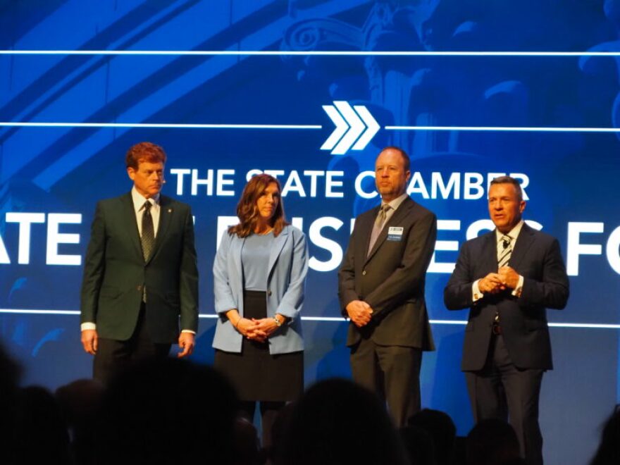 From left, State Chamber executive committee chairperson Rick Nagel, State Chamber Research Foundation chairperson Kristin Peck, chamber Board of Directors member Scott Bilger, and President and CEO Chad Warmington attend a State of Business Forum on Nov. 17 at the National Cowboy & Western Heritage Museum in Oklahoma City.
