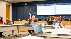 TCC Chancellor Eugene Giovannini, left, chats with TCC board President Teresa Ayala during a meeting Feb. 10, 2022.