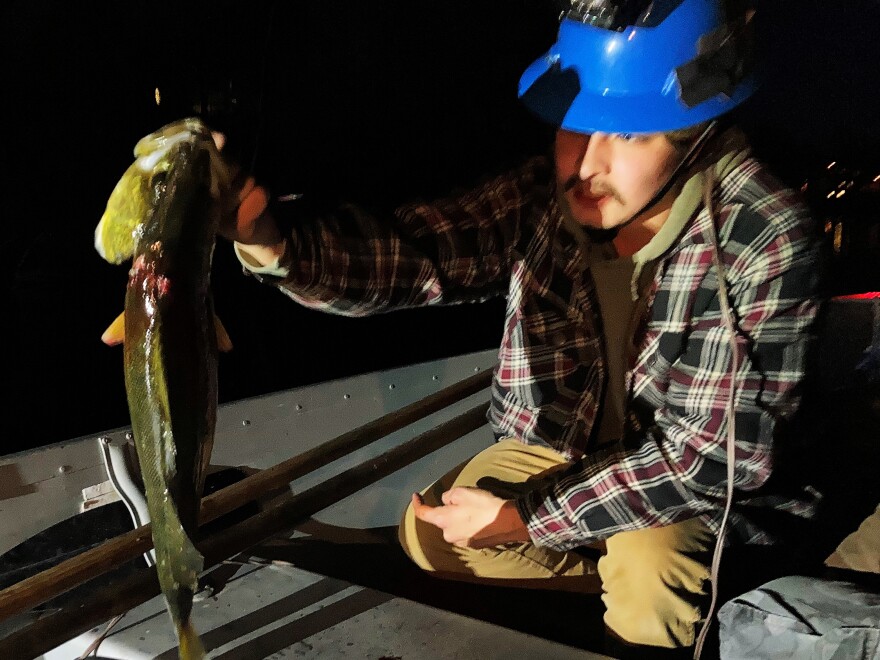 Leo Peterson holds a fish he speared.