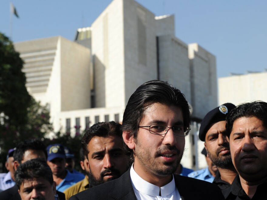 Arsalan Iftikhar Chaudhry (center), son of Pakistan's Supreme Court Chief Justice Iftikhar Muhammad Chaudhry, leaves the Supreme Court after attending a hearing. He is facing allegations of accepting bribes from a powerful property developer totaling some $4 million.