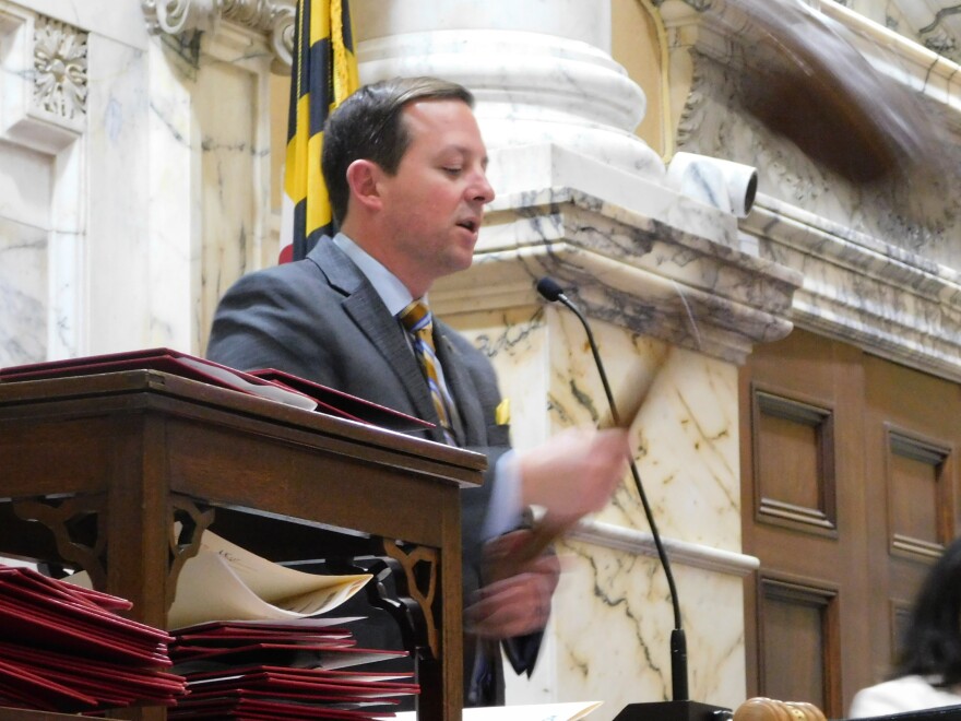 Senate President Bill Ferguson bangs an extra large gavel on the rostrum to mark the end of the 2026 legislative session on Monday in the Senate chamber in Annapolis, Md.
