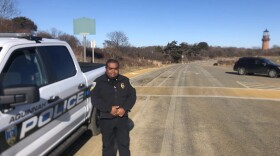Aquinnah Police Chief Randhi Belain in front of his cruiser.
