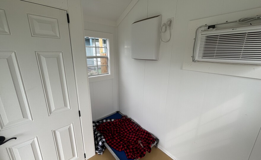 The interior of a tiny home at Animal Care Sanctuary in Bradford County. It features an air conditioning unit, heating and a small closet for pet supplies. The shelter opened its Tiny Home Village on Aug. 5.