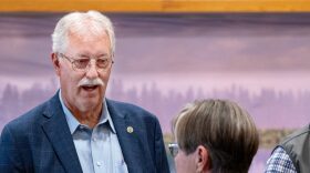 Rep. Jim Minnix talks with Gov. Laura Kelly at a July 9, 2025, news conference on water at the Sternberg Museum of Natural History in Hays.