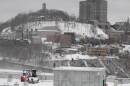 The Cincinnati neighborhood of Mount Adams is shown blanketed in snow Saturday, Jan. 25, 2014, after fresh snow fell across Ohio overnight Saturday and was continuing in the morning, creating hazardous driving conditions that caused several crashes.