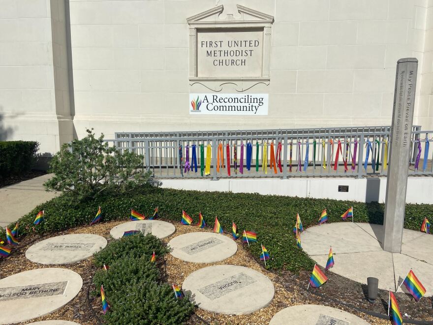 Flags and banners are placed in front of First United Methodist Church in downtown Orlando.