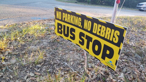 The Santa Rosa County School District put established put up signs to denote over 170 temporary bus stops to facilitate the reopening of schools in the aftermath of Hurricane Isaias.