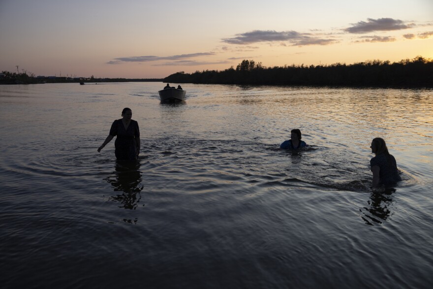 Temperatures reached the mid-70s on June 19, creating a sweltering environment in the church. Some of the attending pilgrims went for a late night swim in the Kwethluk River in front of the village to cool off. June 19, 2025.