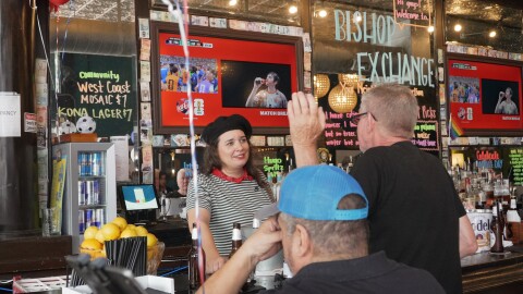 France fans watch the team take on Spain during the World Cup semifinal at Bishop Exchange on Bastille Day.