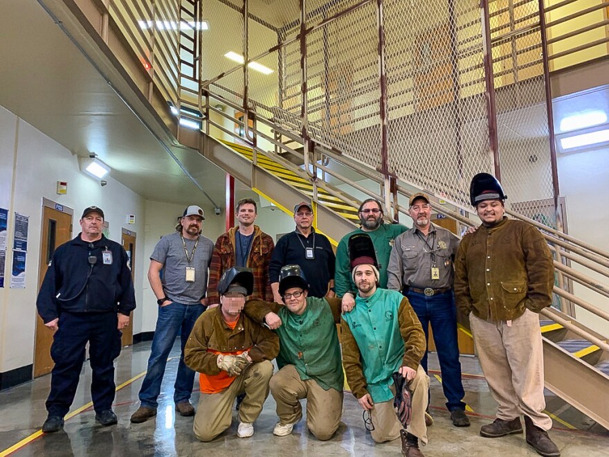 The Washington Department of Corrections team, including inmates, that installed the suicide prevention cages at the Monroe Correctional Complex.