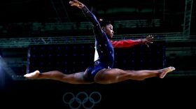 Simone Biles of the United States competes on the balance beam during Women's qualification for Artistic Gymnastics on Day 2 of the Rio 2016 Olympic Games.