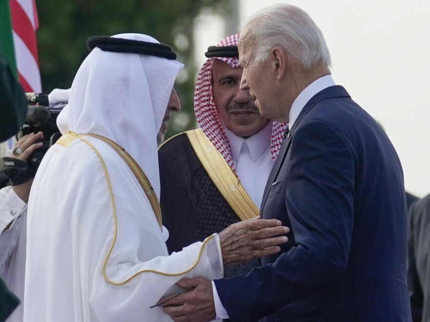 President Biden greets officials as he arrives at King Abdulaziz International Airport in Jeddah, Saudi Arabia.