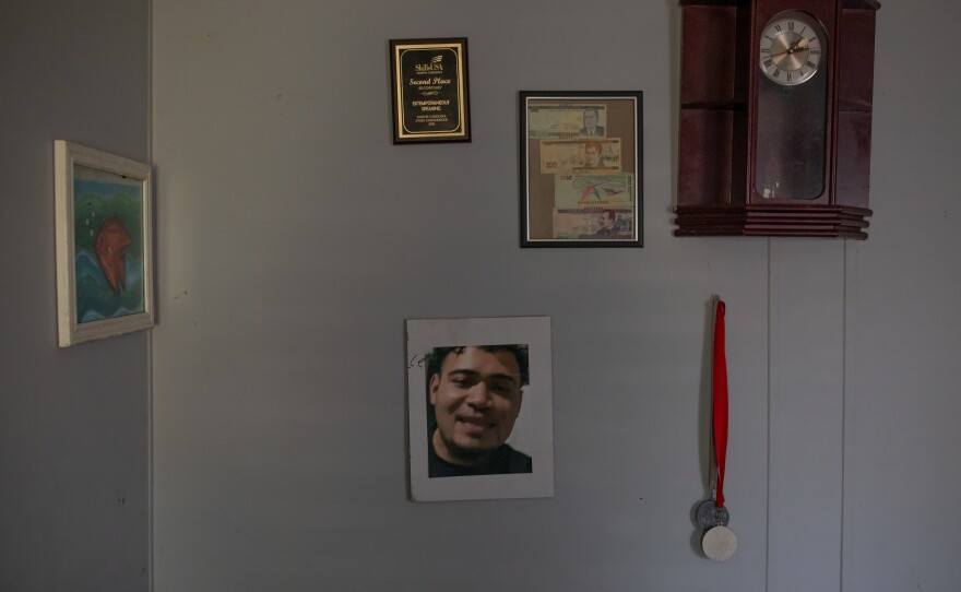 A photo of Edilberto Espinoza Sierra hangs on the wall at his family's home in Wallace on April 17, 2026. Espinoza Sierra was shot and killed by the Wilmington Police Department in the early morning hours of March 8 following an incident in a downtown Wilmington parking garage. Espinoza Sierra was incorrectly identified as a suspect before he was killed and now his family is seeking answer and accountability.