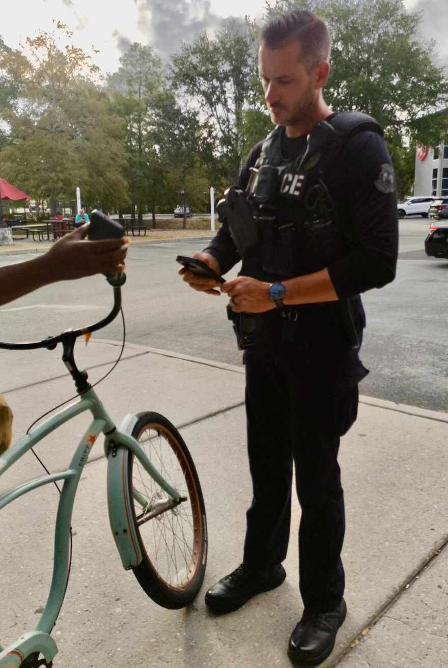 Police officer Nathan Lynn, from the Sarasota homeless outreach team, carries around this card to read to people who he encounters sleeping or lodging outside on public property.
