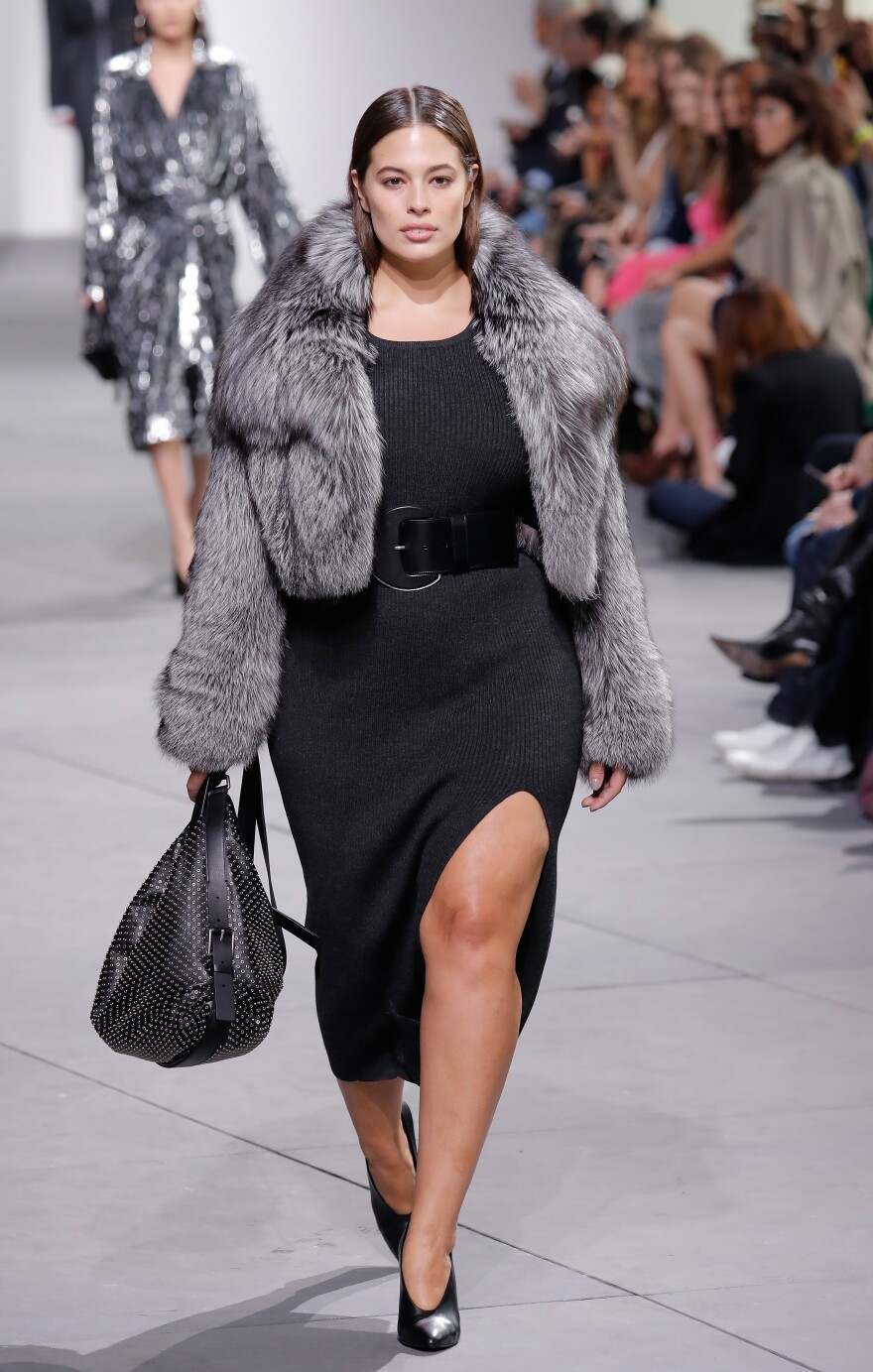 Plus-size model Ashley Graham walks the runway during the Michael Kors Collection Fall 2017 fashion show last month in New York City. UCLA psychologist Janet Tomiyama says there are signs that the strong anti-fat bias in our culture may be shifting.