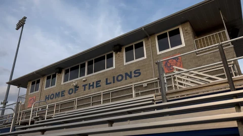 The sun sets on the press box of the Lion’s Field football stadium at Carterville High School on March 3, 2026, in Carterville, Illinois.
