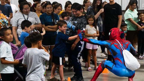 Superheroes have been known to make an appearance at past Lerner & Rowe backpack giveaways.