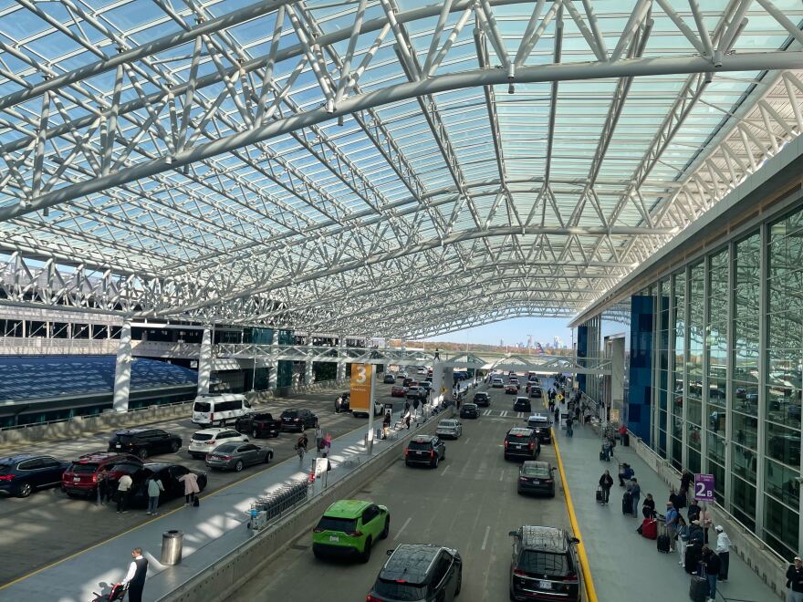 Travelers arriving at Charlotte Douglas International Airport