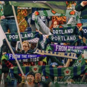 Fans with  Heart of Pine flags and paraphernalia