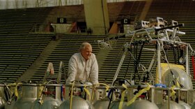 American balloonist Steve Fossett inspects his craft, the Solo Spirit, at the Malvinas soccer stadium in Mendoza, Argentina, Aug., 7, 1998. Fossett will attempt, for the fourth time, to be become the first person to fly around the world in a balloon. (AP Photo/Eduardo Di Baia)