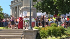 People gathered downtown at the Monroe County Courthouse Monday.