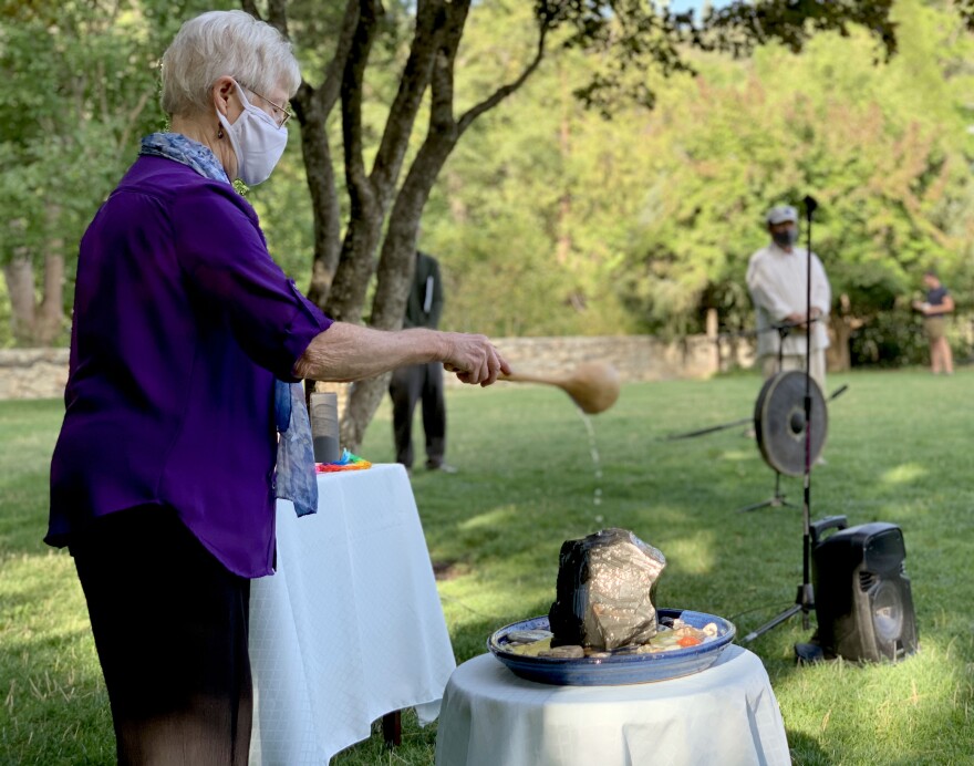 Peace House member Estelle Voeller led a water ceremony to "sooth the souls of the departed" in Hiroshima and Nagasaki after the 1945 nuclear bombing that killed thousands. 