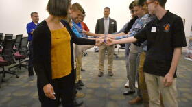 Youth apprentices with CareerWise Elkhart County participate in a team-building activity while Jason Harrison of Horizon Education Alliance supervises.