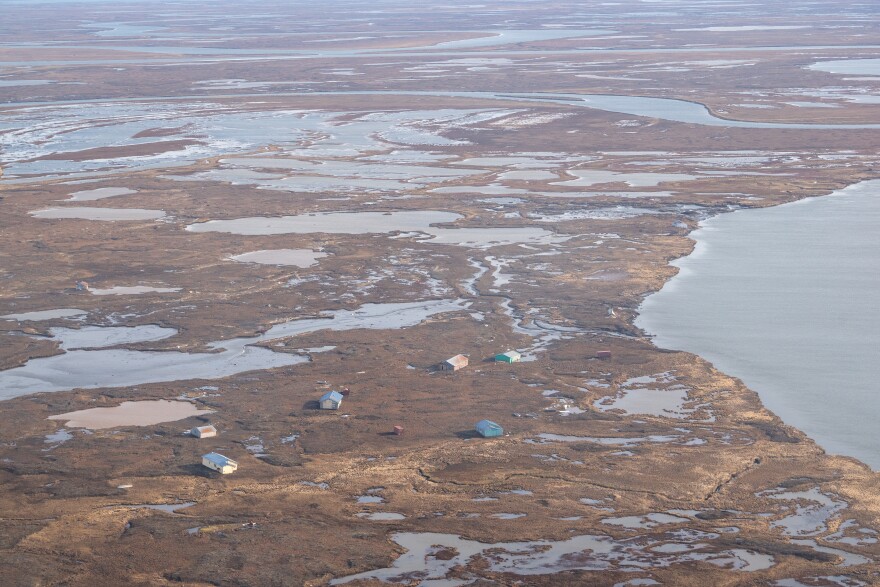 Homes and other buildings that floated off their foundations in Kipnuk, Alaska rest on tundra miles upriver on Oct. 19, 2025, a week after the remnants of Typhoon Halong brought record flooding and high winds to the Western Alaska village.