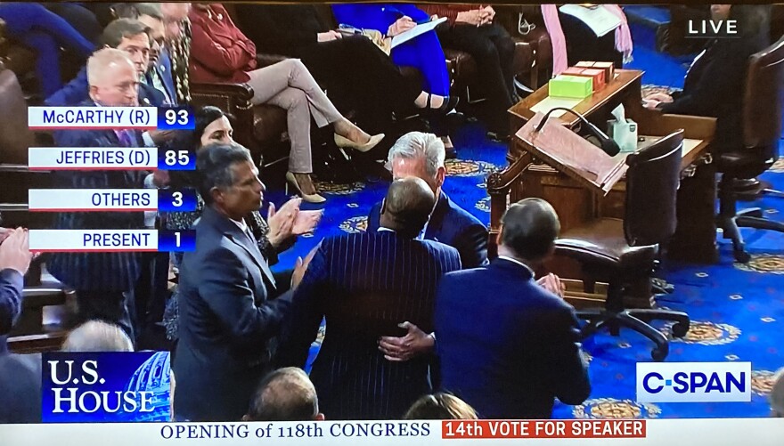 Republican House members confer with speaker candidate Kevin McCarthy late Friday night.