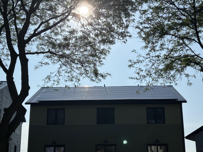 Solar panels are installed on the roof of every home in this net-zero energy community