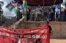 A couple dozen unarmed pro-Palestinian protestors chanted and gave speeches in the gazebo of Milam Park Tuesday, Oct. 7, 2025.