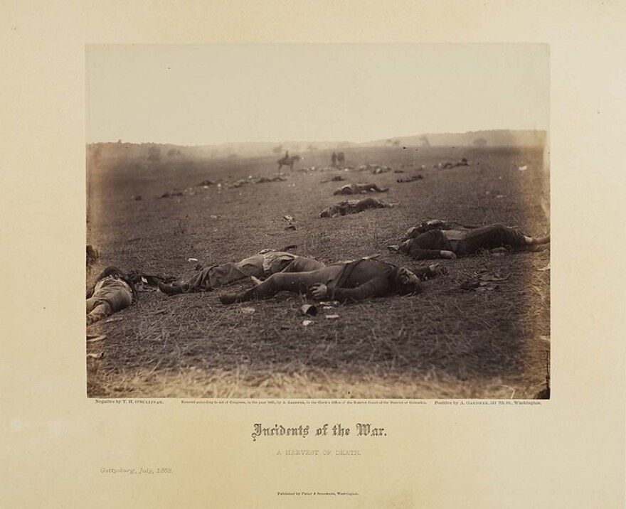 "Incidents of the War: A Harvest of Death" bodies of fallen soldiers litter the battlefield at Gettysburg. Artist: Timothy H. O'Sullivan albumin print on paper