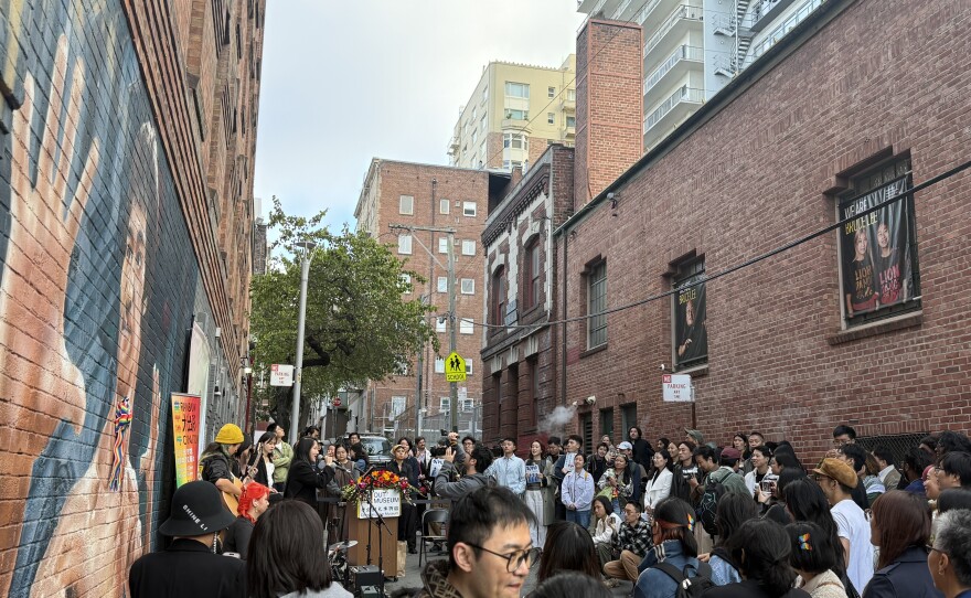 Crowd celebrating the opening.