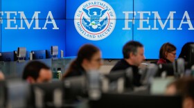 FILE - People work at the Federal Emergency Management Agency headquarters in Washington, on Saturday, Jan. 24, 2026. (AP Photo/Julia Demaree Nikhinson, File)
