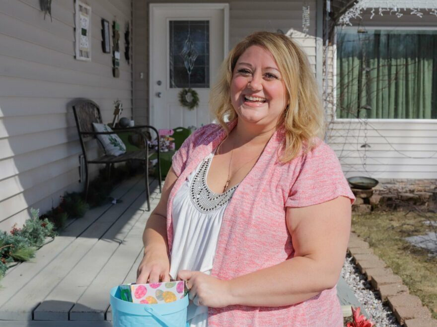 Wasilla resident Karina Wentworth sets out Easter decorations.