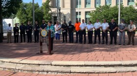 Lexington Mayor Linda Gorton makes remarks at a downtown vigil honoring recent victims of gun violence.