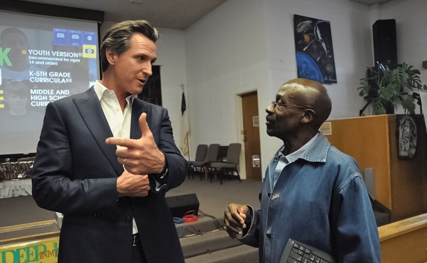 Juan Haines talks to California Governor Gavin Newsom. Juan says his ultimate goal as a reporter is to get a sit-down interview with the governor.