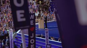 US President Joe Biden speaks on stage on the first day of the Democratic National Convention (DNC) at the United Center in Chicago, Illinois.