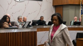 Mari Willis walks away after commenting on the firings of Michael Marrero and Natasha Brooks