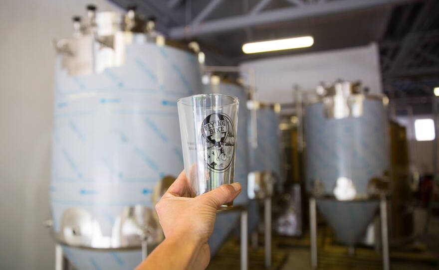 Raising a glass at Flying Bike's new space in Greenwood.