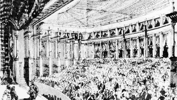 Sketch of an audience in a large theater watch a performance. The actors on stage are dressed in Viking hats and cloaks. 
