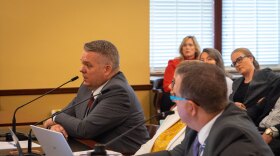 Davis School District Superintendent Dan Linford answers questions from legislators about the district’s review process for challenged books during an Administrative Rules Review and General Oversight Committee on June 12, 2023, at the Utah State Capitol. District school board President Liz Mumford (middle) and Assistant Superintendent Logan Toone (right) sit beside Linford.