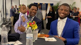 Michaiah Miller, (right) a teacher assistant and wrestling coach at Harding University High, attended the CMS Gem Awards with his father and 1-year-old daughter.