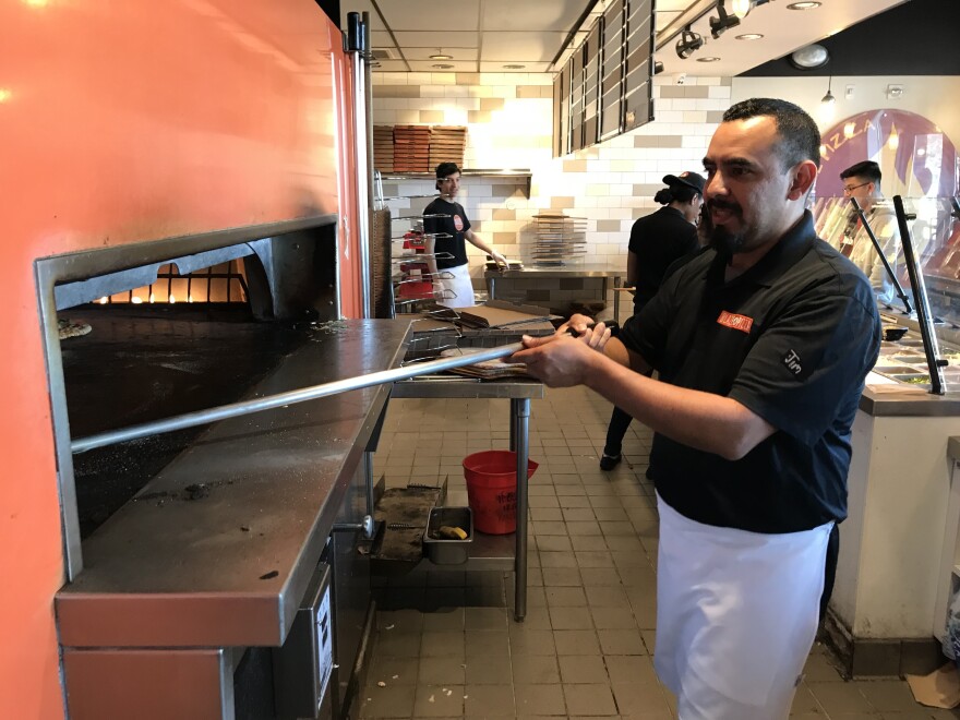 Jimmy Mejia works 50 hours a week as an assistant manager at Blaze Pizza.